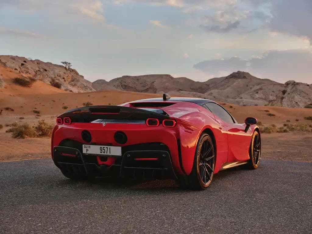 Ferrari SF90 Stradale — Red luxury car rental Dubai — view 4