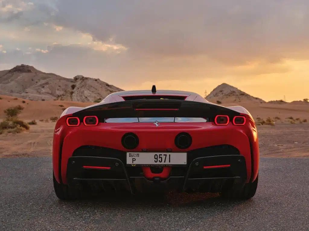 Ferrari SF90 Stradale — Red luxury car rental Dubai — view 3